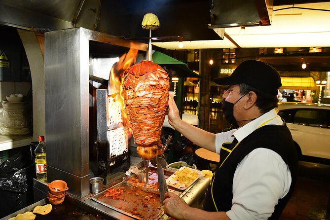 A Night of Tacos and Mezcal in Mexico City - Cuauhtémoc al pastor finale, spit-roasted and flavor-focused