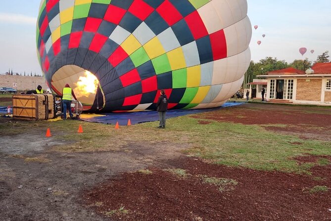 Balloon flight + Breakfast + Transportation from CDMX (SMALL GROUP) - Who should book this balloon and cave morning?