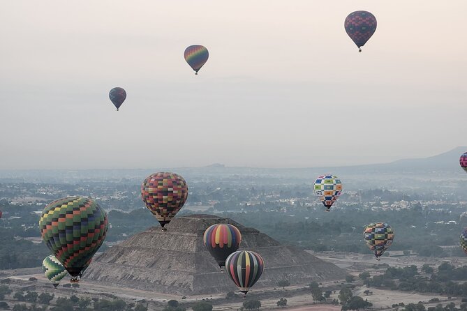 Balloon flight + Transportation + Breakfast in Cave or buffet + Pyramids - Regional Liquor Tasting: A Small Culture Bonus