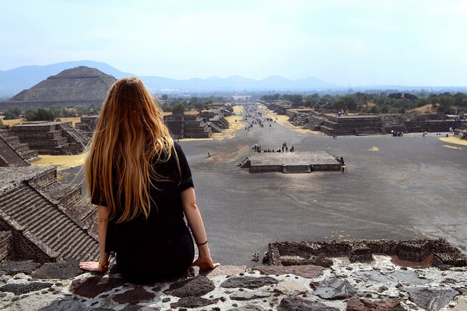 Flight + Transportation + Breakfast + Tour and Pyramid Ascent. - Tasting mezcal, pulque, and tequila at Tlalocan