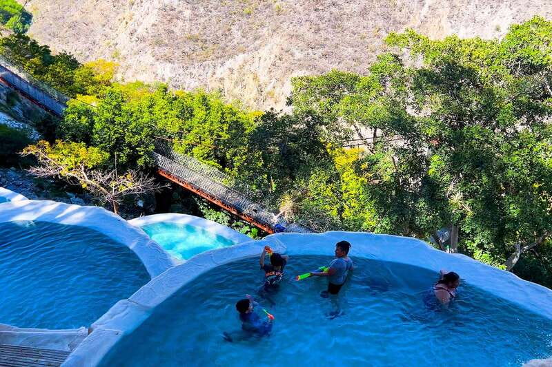 From Mexico City: Tolantongo Hot Springs Day Trip with Guide - Suspension bridge and trails: how to pick your effort level