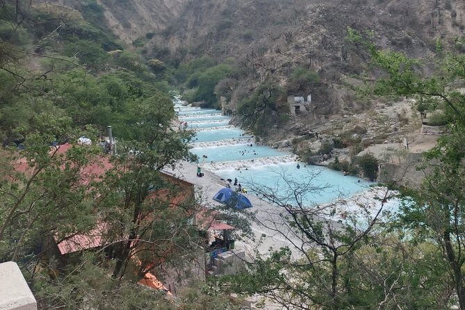Full Day Private Tour to Tolantongo Caves from CDMX - Entering La Gruta: thermal water, steam, and that 3-meter tunnel