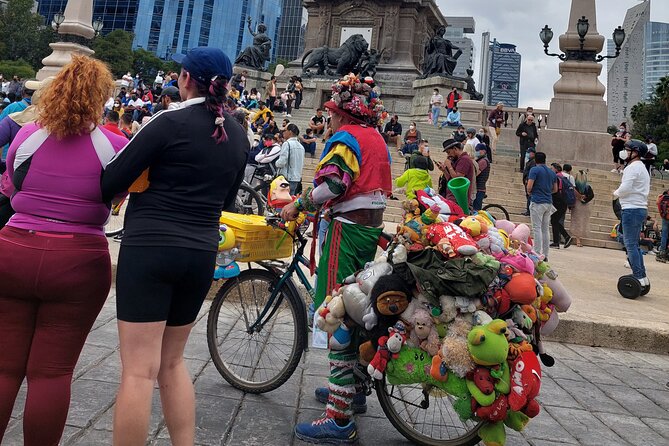 Mexico City E-Bike Tour with a taco and churros stop - Roma Norte stop: architecture, style contrasts, and the movie connection