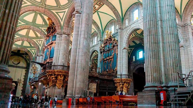 Mexico City: Historic Downtown Walking Tour - Aztec ruins beside the cathedral: seeing the city layers