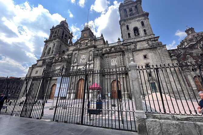 Mexico city's private tour in downtown (with transport) - Zocalo: the flag ceremony, the subway lobby models, and a bronze foundation marker