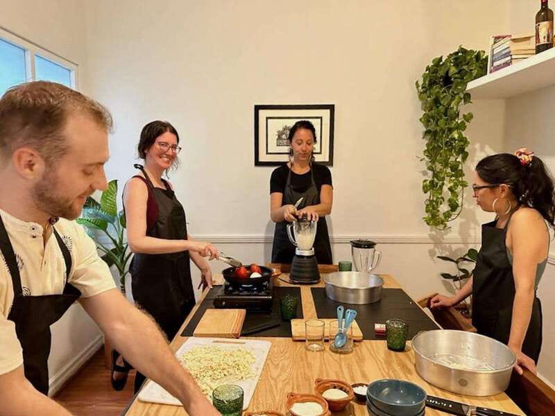 Tamales 101: Multi-variety tamal cooking class and feast - Rolling classic green tamales with tomatillo tang