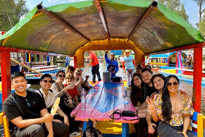 Trajinera Party at Xochimilco with Drinks, Mariachi & Snacks - The Boat Ride: Music, Dancing, and the Mariachi Moment