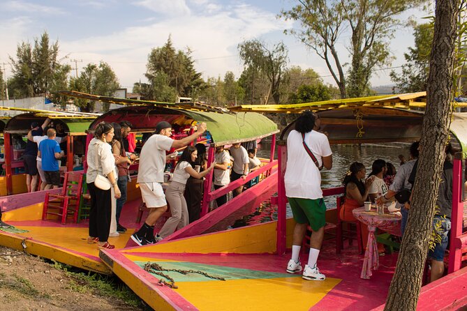 Xochimilco BOAT LIGHT PARTY WITH 1 DRINK AND 4 TAQUITOES + 18 - What’s included: unlimited tequila, beer, Micheladas, margaritas, plus snacks