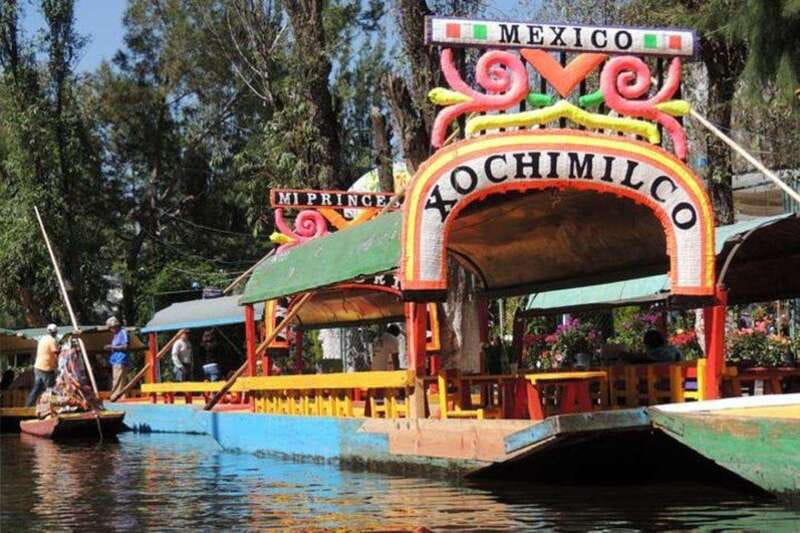 Xochimilco floating gardens, Coyoacan and UNAM murals - A 6-hour sweep of canals, colonial streets, and UNAM art