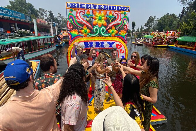 Xochimilco & Mexican Party with Guacamole & Unlimited Drinks - Entering Xochimilco on a trajinera with party music and real history talk