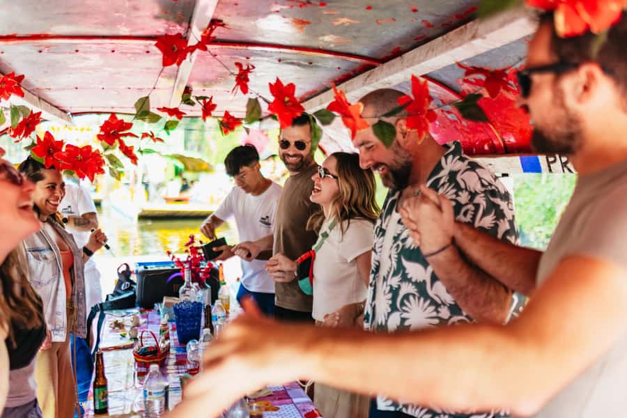 Xochimilco: traditional boat tour, culture, and fun. - Mezcal tasting at the end, plus a possible axolotl add-on